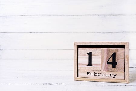 Valentine day. Wooden calendar with February 14 on it.の写真素材