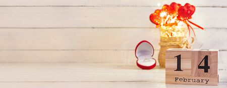 Valentine day. Wooden calendar with February 14 on it.