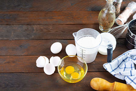 Flour with kitchen accessories for making dough. Dough for baking.