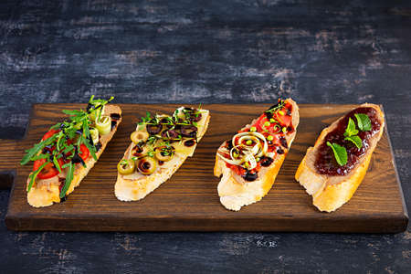 Bruschetta with chicken liver paste. Delicious bruschettas with various fillings. Different...