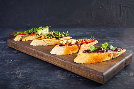 Bruschetta with chicken liver paste. Delicious bruschettas with various fillings. Different...