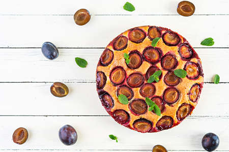 Delicious homemade plum pie on white background. Top viewの写真素材