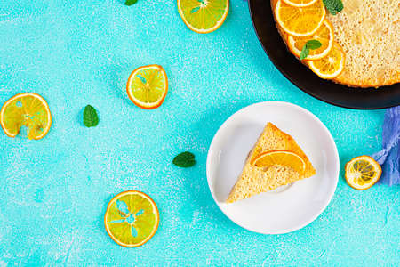 Delicious homemade orange tart on blue backgroundの写真素材