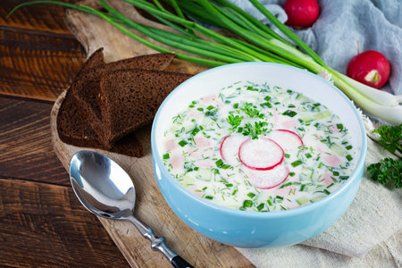 Summer cold soup with yogurt and vegetables. Traditional russian cold soup okroshkaの写真素材
