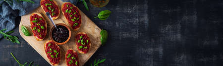 Bruschetta with grated beetroot, herbs and caramelized onion. top view