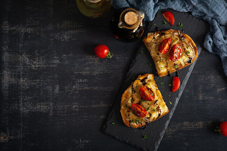 Hot sandwich with caramelized onion and cheese. Roasted bread toastの写真素材