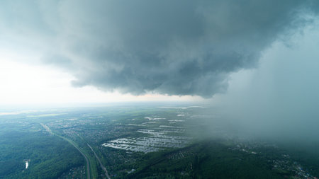 Aerial view of the city with thunderclouds in the sky