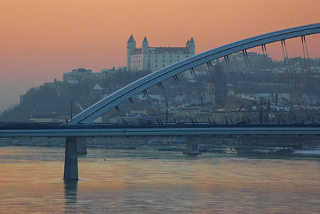 Bratislava castle behind the bridgeの写真素材