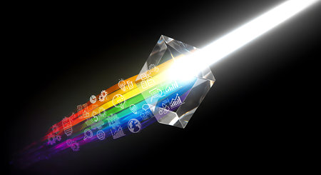 Digital illustration of diamond  against black background with colourful lights and flaresの素材