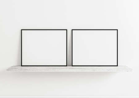 Double 8x10 Horizontal Black Frame mockup on white wooden shelf and clean whitewall behind it. 3D Rendering.の写真素材