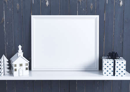 Single 8x10 Horizontal White Frame mockup with Christmas decorations on white shelf and blue rustic wooden wall behind it. Empty picture frame mockup on white shelf. 3d Renderingの写真素材