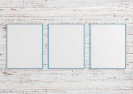 Triple 8x10 Vertical Blue Frame mockup on rustic wooden white wall. Three Empty picture frame mockup on rustic wooden white background. 3D Rendering.の写真素材