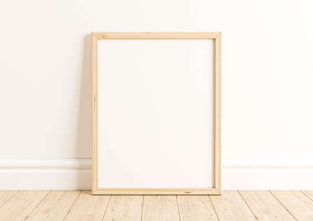 Single 8x10 Vertical Wood Frame mockup on wooden floor and white wall behind it. Empty picture frame mockup on wooden floor and white background. 3D Rendering.の写真素材