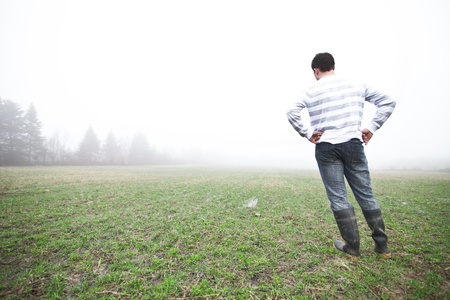 In the foggy fieldの写真素材