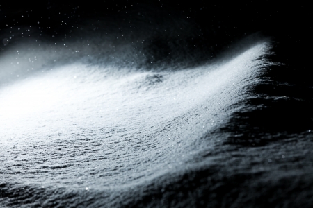 Shiny snow at night during a snow stormの写真素材