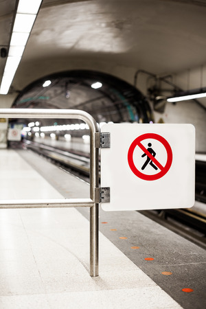 Safety Interdiction Sign (Do not Cross) on a Underground Subway Platformのeditorial素材
