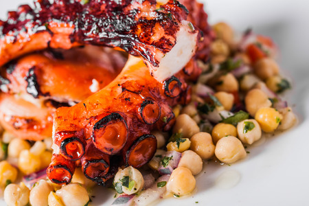 Cooked Octopus Plate with ChickPeas in a Portuguese Restaurantの写真素材