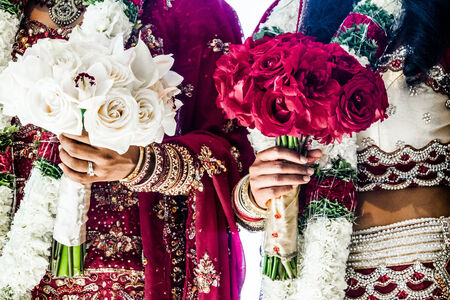 Red and White Traditional Indian Wedding Bouquets and bridesの写真素材