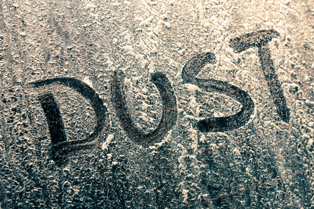 Dust Word on a Dusty Car Windowの写真素材