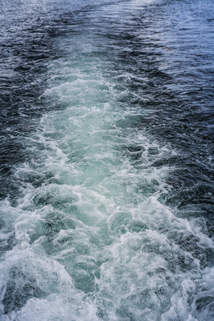 Waves Background Created but A big Boat - Top viewの写真素材