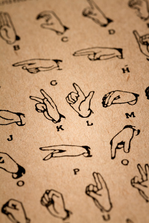 October 1st, 2015 - Montreal, Canada. Close-up of an Old 1945 Webster Vintage Dictionary showing Sign Language (ASL)のeditorial素材