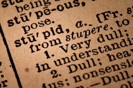 October 1st, 2015 - Montreal, Canada. Close-up of an Old 1945 Webster Vintage Dictionary showing the Word STUPIDのeditorial素材