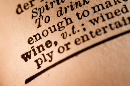October 1st, 2015 - Montreal, Canada. Close-up of an Old 1945 Webster Vintage Dictionary showing the Word WINEのeditorial素材