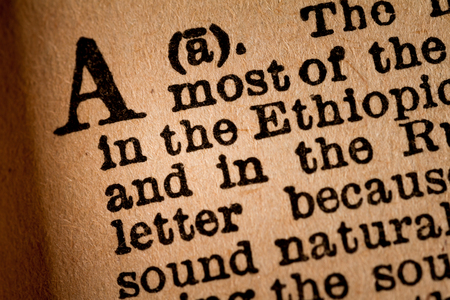 October 1st, 2015 - Montreal, Canada. Close-up of a A, the 1st Letter of the Latin Alphabet into a Old Pronunciation Dictionaryのeditorial素材