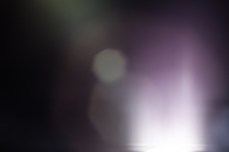 Real Lens Flare Shot in Studio over Black Background. Easy to add as Overlay or Screen Filter over...