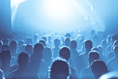 Back lit Blue ambiance and and Crowd in silhouette during a Concertのeditorial素材