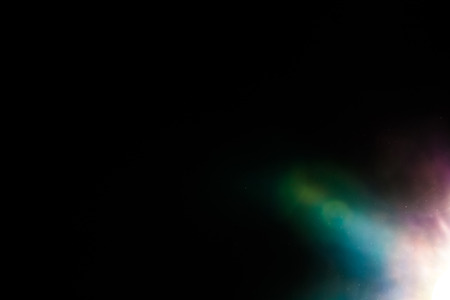 Real Lens Flare Shot in Studio over Black Background. Easy to add as Overlay or Screen Filter over Photosの写真素材