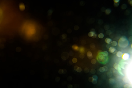 Real Lens Flare Shot in Studio over Black Background. Easy to add as Overlay or Screen Filter over Photosの写真素材
