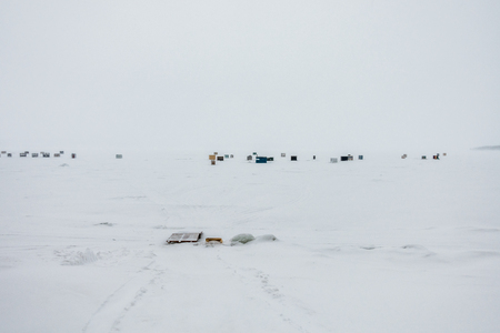 Miguasha, Canada - February 16, 2017. Ice Smelt Fishing Shack during a Freezing and Windy Day of Winter in Quebecのeditorial素材