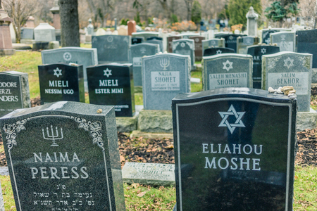 Montreal, Canada _ November 30, 2017. Jewish Graveyard in Montreal on cold day of Autumn. The Shaar Hashomayim Cemetery was established in the mid-1860s on the northern slope of historic Mount Royal.のeditorial素材