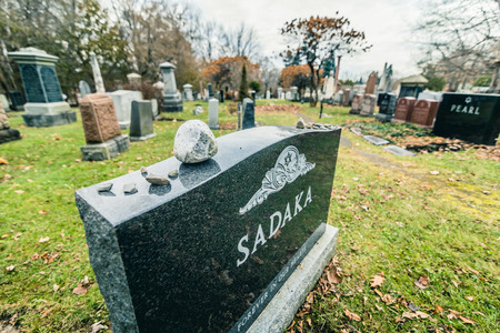 Montreal, Canada _ November 30, 2017. Jewish Graveyard in Montreal on cold day of Autumn. The Shaar Hashomayim Cemetery was established in the mid-1860s on the northern slope of historic Mount Royal.のeditorial素材