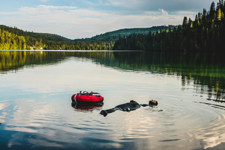 GASPESIE, CANADA _ JULY 20, 2017. Couple Floating and Relaxing on this Beautiful Lake after Freeding Session.のeditorial素材
