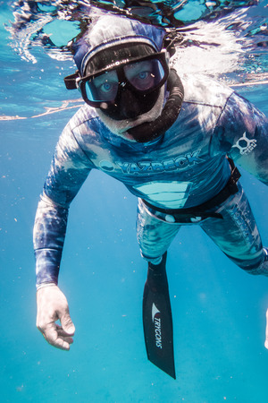 SAN ANDRES ISLAND, Colombia _ Circa March 2017. Freedivers Breathing-up at Surface looking at the...