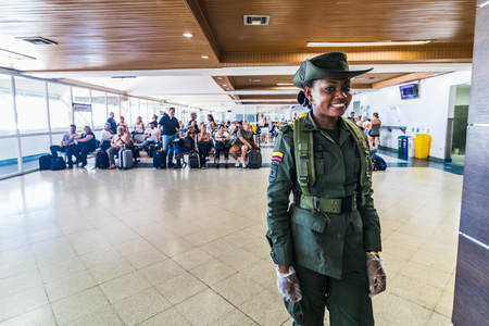 SAN ANDRES ISLAND, Colombia _ Circa March 2017. Gentle Security Staff Inspecting People Coming into the Waiting Room at the San Andres Airport.のeditorial素材
