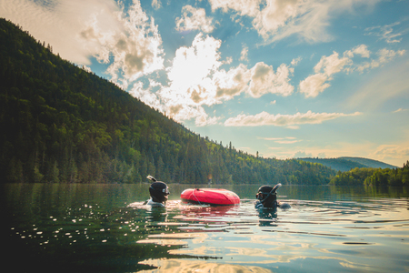 GASPESIE, CANADA _ JULY 20, 2017. Freediver Couple Talking together at the Buoy and Getting Ready for the next Diveのeditorial素材