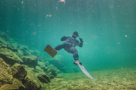 BONAVENTURE, CANADA _ JULY 19, 2017. Freediver Letting hiself go with the Strong Current of The Bonaventure Riverのeditorial素材