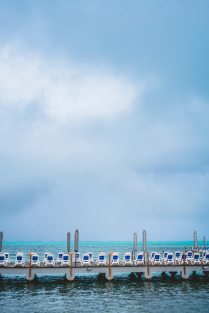 All Inclusive Resort Pier, Chairs and Ocean Viewの写真素材