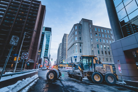 Ottawa, Ontario, Canada - January 30 2022. Roadblock using Snowplow during the Convoy for Freedom...