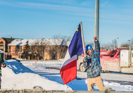 Montreal, Quebec, Canada - January 28 2022. Cheering and Supporting Crowd on the Highway for the Freedom Convoy 2022 in Direction of Ottawa.のeditorial素材