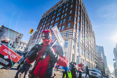 Ottawa, Ontario, Canada - January 29 2022. Protester in Costume of Dreadpool Protesting in the...