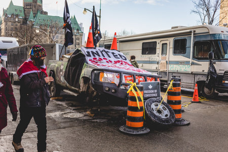 Ottawa, Ontario, Canada - January 31 2022. Dismantled Pick-up in the Street During the Convoy for Freedom 2022 Trucks and Tracors Protestのeditorial素材