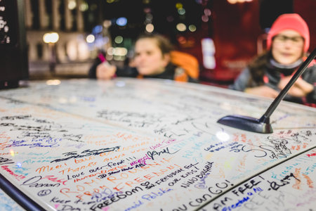 Ottawa, Ontario, Canada - February 10, 2022. Freedom Convoy Protest in Ottawa. People Signing and Writing Motivation and Thank you Messages on Cars and Trucks.のeditorial素材