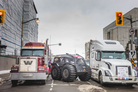 Ottawa, Ontario, Canada - February 11, 2022. Parked Truck on Wellington street with message during Freedom Convoy Protest in Ottawa.のeditorial素材