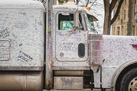 Ottawa, Ontario, Canada - February 11, 2022. Freedom Convoy Protest in Ottawa. People Signing and Writing Motivation and Thank you Messages on Cars and Trucks.のeditorial素材
