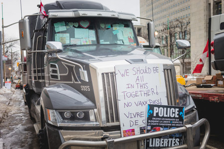 Ottawa, Ontario, Canada - February 11, 2022. Parked Truck on Wellington street with message during Freedom Convoy Protest in Ottawa.のeditorial素材