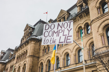 Ottawa, Ontario, Canada - February 11, 2022. Protester Message on Wellington Street Front or Parliament Hill During Freedom Convoy Protest in Ottawa.のeditorial素材
